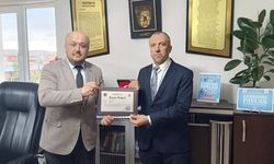 Ulaş ilçesinde görevli imam Murat Güveç'e başarı belgesi verildi