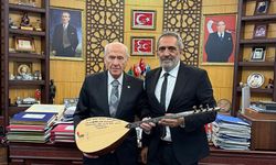 MHP Genel Başkanı Bahçeli, sanatçı Yavuz Bingöl'ü makamında ağırladı