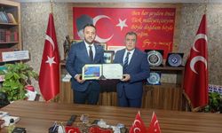 MÜSİAD Heyeti, MHP İl Başkanı Ayhan Sezer’i Ziyaret Etti