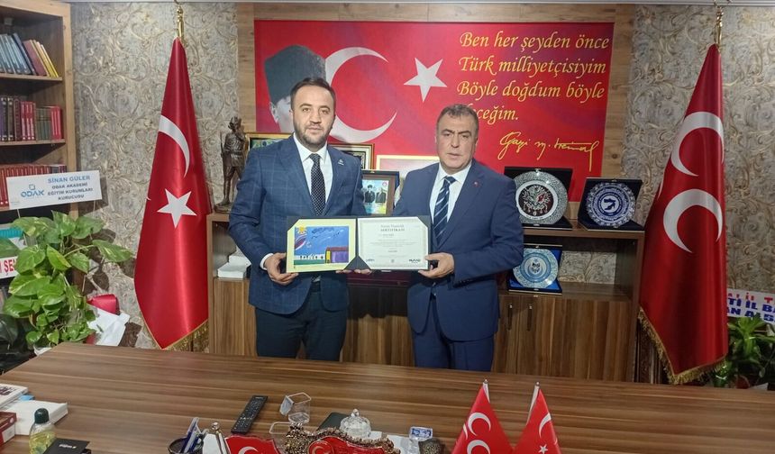 MÜSİAD Heyeti, MHP İl Başkanı Ayhan Sezer’i Ziyaret Etti